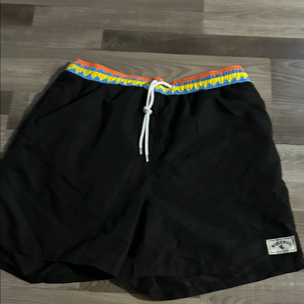 Absolutely Creative Worldwide Black Swim Trunks with Vibrant Waistband